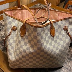 Tote stained inside. Clutch. Wallet. Change purse. All very worn